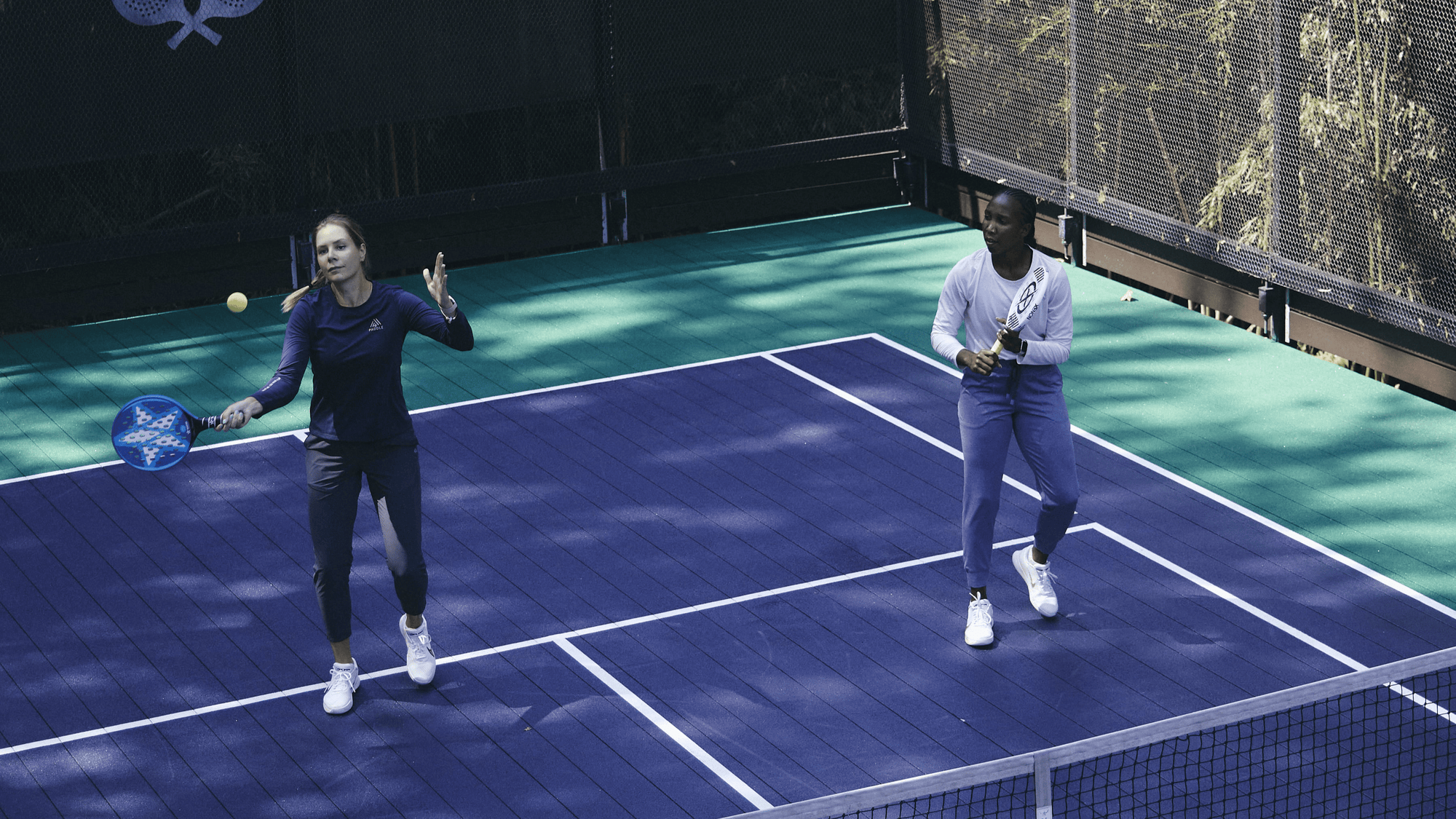 Lynn and Vera playing platform tennis for M4